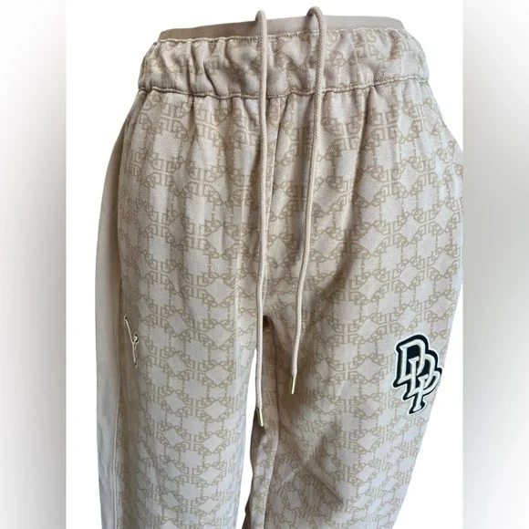 PUMA x Dapper Dan Jacquard Monogram Track Pants Tan Small NWT